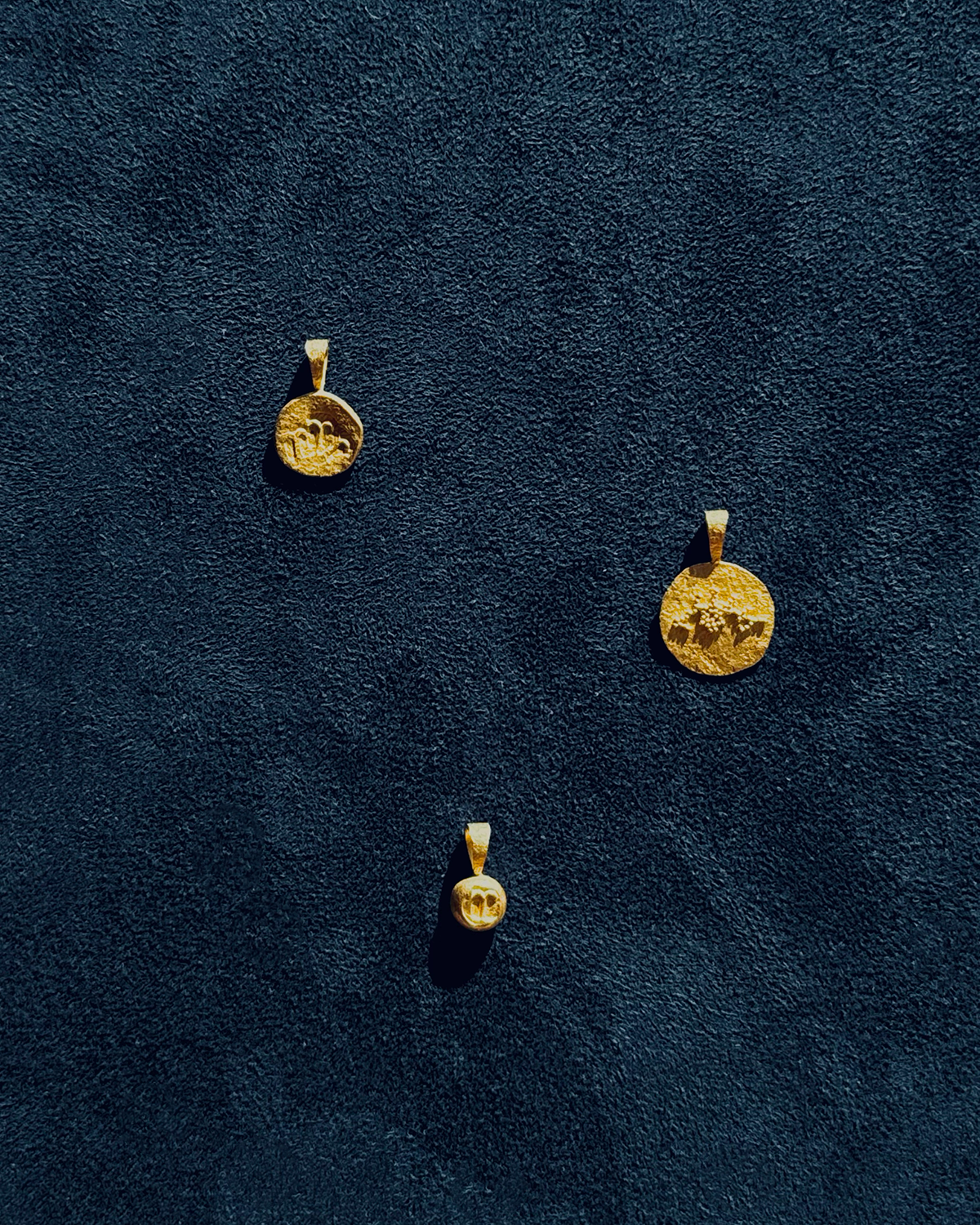 Hand-forged pendant set