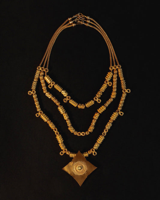 Three-Strand Beaded Necklace with Sun Chief Medallion
